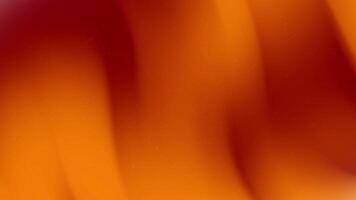Blurry orange and red abstract background ideal for vibrant and modern designs, artistic projects, website backgrounds, and eyecatching visuals. video