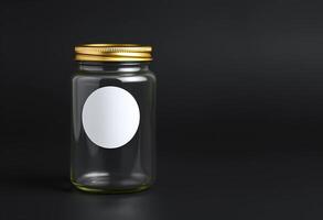 A blank white circular sticker label mockup is attached to a transparent empty jar bottle with a dark background photo