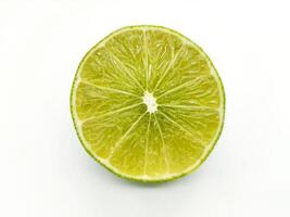 Top View of a Fresh Lime Slice on White Background photo