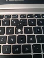 a close up of a keyboard with the word u on it photo