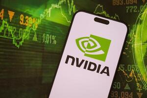 KYIV, UKRAINE - JANUARY 29, 2025 Nvidia corporation logotype showed on iPhone 15 smartphone display screen. Nvidia is a global leader in artificial intelligence hardware photo