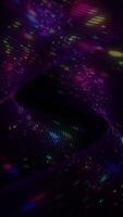 A spinning spiral of bright glowing colorful LED disco lights - shiny glittering stage lights. Full HD and looping performance or party vertical background. video