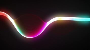 Rainbow colored spectrum wave flows smoothly across a black background video