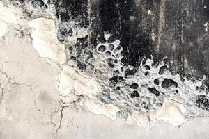 This background presents a textured concrete surface featuring abstract patterns and rich details, highlighting natural imperfections and variations in tone, perfect for creative projects photo