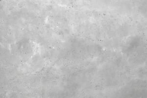 Textured concrete surface presents a high definition abstract background ideal for use in various creative projects, providing a neutral and modern aesthetic suitable for design applications photo