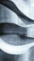 This composition features a textured concrete surface with flowing abstract curves, highlighting the innovative elements of contemporary architectural design through its smooth lines and shadows photo