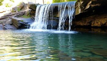 Serene Waterfall Cascading into a Tranquil Pool photo