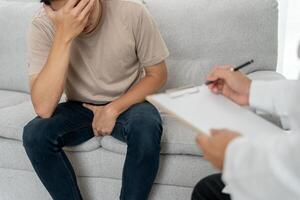 Man hold hand in front of private parts feeling discomfort and consult doctor. Venereal, testicular cancer. bladder problems, erectile dysfunction, premature ejaculation photo
