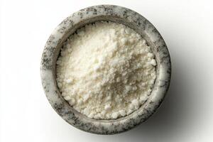 Isolated Marble Mortar with Fine Powder on White Background photo