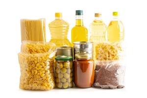 Foodstuffs in donation box isolated on white background with clipping path for volunteer to photo