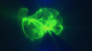 Abstract green glowing shape resembling fluid energy flow on a dark video