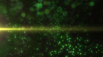 Green bokeh lights on a dark background, emitting a mysterious and atmospheric glow video