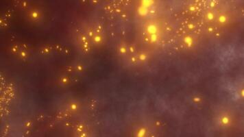 A glowing, golden abstract background with scattered light particles and smoky textures, resembling cosmic energy or fireflies in a misty atmosphere, video