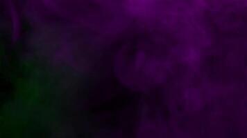 Smoke from Ultrasonic Aroma Diffuser and colorful light on black background video