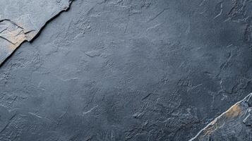 Textured dark stone surface ideal for backgrounds, overlays, or design projects. photo