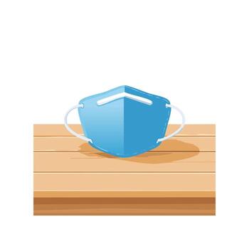 dust mask folded neatly on a table vector