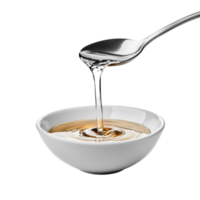 Liquid gracefully pours from a spoon into a pristine white bowl, spoon with liquid pouring out it in a bowl, Transparent background png