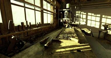 Old workshop with wooden tools illuminated by afternoon sunlight video