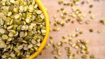 Split Mung Beans Green Gram in a Bowl Close-Up Top View Flat Lay photo