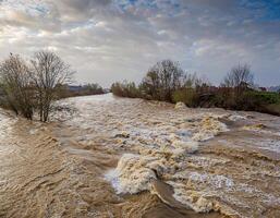 Extreme Weather Causes River to Overflow, Leading to Severe Flooding photo