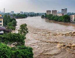 Extreme Weather Triggers River to Overflow, Flooding Surrounding Areas photo