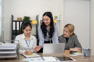 Collaborative business team meeting office document review professional environment close-up view teamwork concept photo
