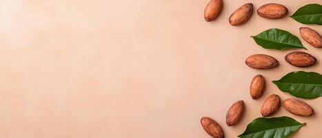 Rich cacao beans and green leaves arranged on textured background evoke sense of nature bounty and indulgence photo