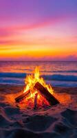 Cozy beach bonfire at twilight with glowing embers, creating warm atmosphere against vibrant sunset. waves gently lap at shore, enhancing serene ambiance photo