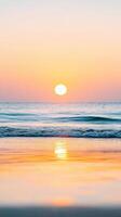 stunning sunset over ocean with gentle waves reflecting warm colors. serene atmosphere evokes sense of peace and tranquility as sun sets on horizon photo