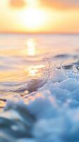 stunning sunset over ocean with gentle waves creating splashes of water, reflecting warm hues of orange and gold. serene atmosphere evokes sense of tranquility and beauty photo