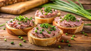 Tuna on toast with green peas and parsley photo