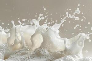 A lively splash of milk creates numerous droplets as it interacts with a surface, showcasing the beauty and energy of liquid in motion, often seen in cooking scenarios photo