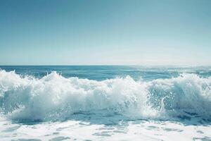 Bright sunlight illuminates the ocean as waves crash onto the shore, creating a peaceful atmosphere. The water sparkles, inviting relaxation and contemplation photo
