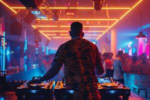 Dj in nightclub with neon lights photo