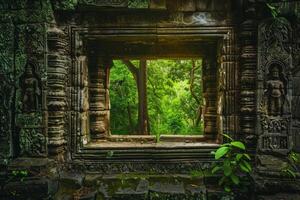 The window of an ancient temple in the jungle photo