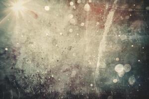 A grunge background with a sun shining through photo