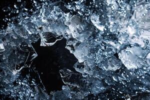 A close up of ice with a hole in the middle photo