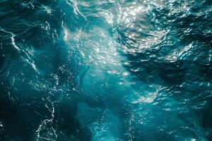 A view of the ocean from above with waves photo