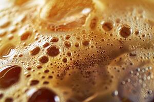 This captivating image captures the texture and bubbles of a golden-brown beverage, illustrating its effervescence and rich color under natural light photo