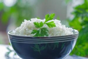 A bowl of fluffy white rice is garnished with a fresh sprig of parsley, set against a backdrop of green leafy herbs, creating a vibrant and appetizing display photo