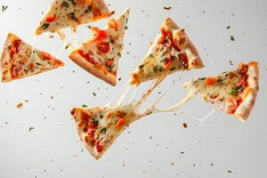 Slices of pizza are airborne, showcasing melted cheese stretching appealingly. The vibrant toppings add a fun, dynamic feel to the kitchen atmosphere photo