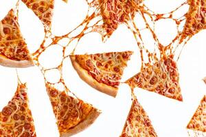 A variety of pepperoni pizza slices are creatively arranged against a white backdrop, highlighting the gooey melted cheese and crispy crusts photo