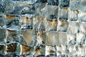 A close-up of textured ice cubes reveals their intricate shapes and trapped bubbles. The soft lighting highlights the clear, refreshing qualities of the ice in a cozy setting photo