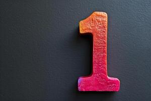 A colorful number 1 is on a black background photo