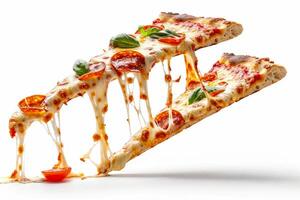Two slices of pepperoni pizza are lifted, revealing gooey melted cheese and fresh basil. The crust is golden and crispy, inviting a delightful dining experience photo