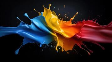 Colorful paint splashes on black background photo