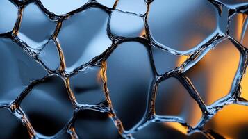 A close up of a glass surface with a blue background photo
