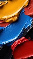 Colorful paint strokes on a black background photo