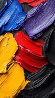 Colorful paint on a black background photo