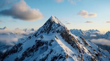 A mountain peak is shown in the distance with clouds photo